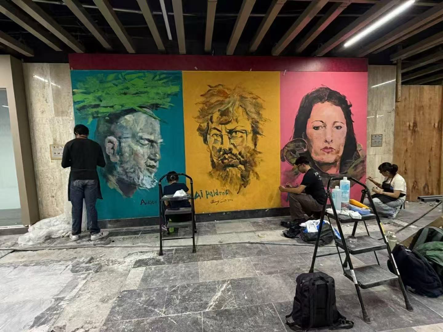 Three portrait murals being restored at Mexico City Metro